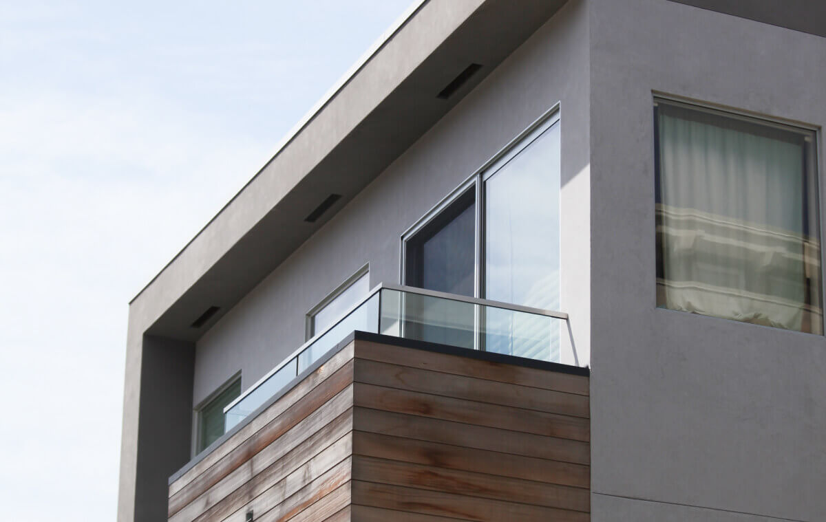 The side of a modern house with a balcony
