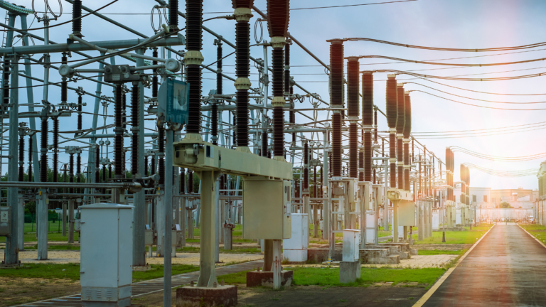 A substation with light from the sun transmitting through